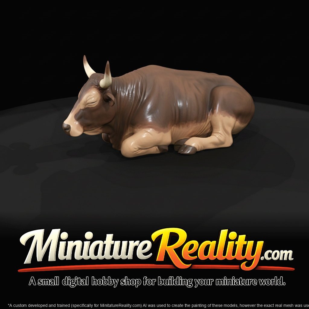 reclining bull / cattle figurine