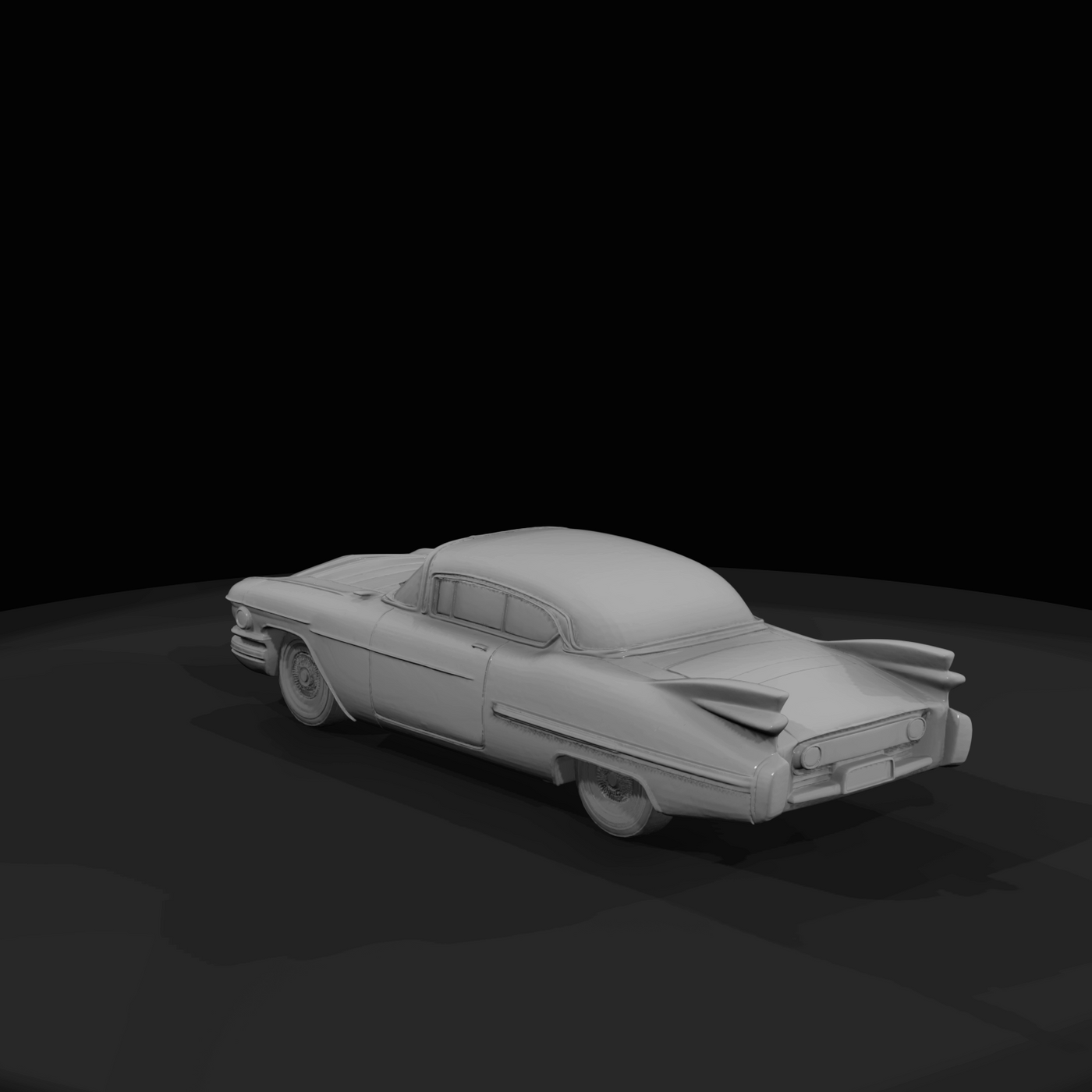 large American two-door coupe with pronounced tailfins (late 1950s) — classic chrome-era styling