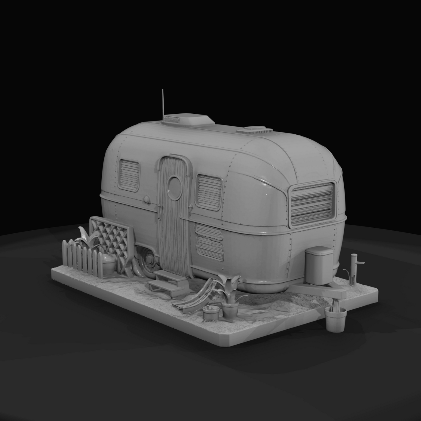 Airstream-style travel trailer (scale model / diorama)