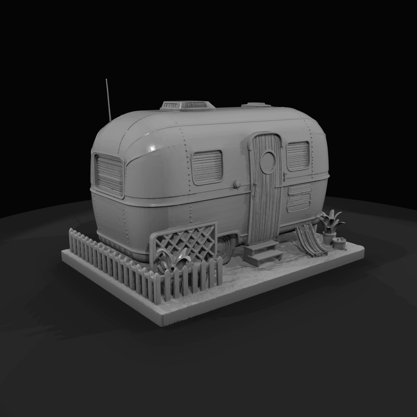 Airstream-style travel trailer (scale model / diorama)