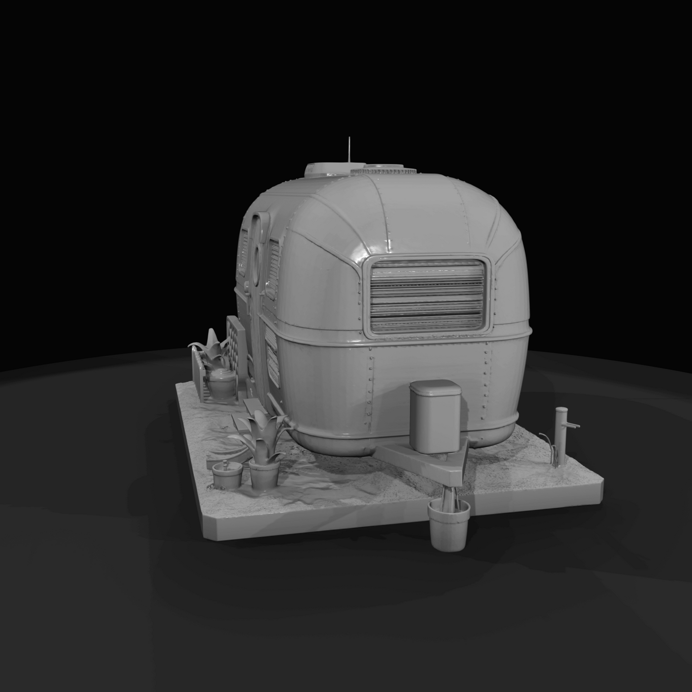 Airstream-style travel trailer (scale model / diorama)