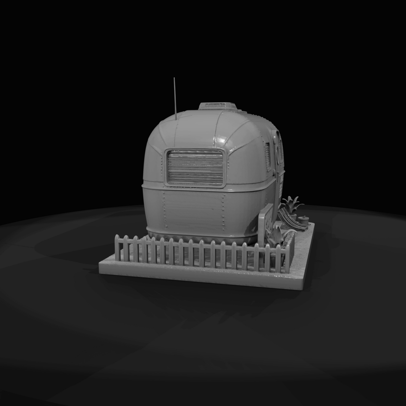 Airstream-style travel trailer (scale model / diorama)