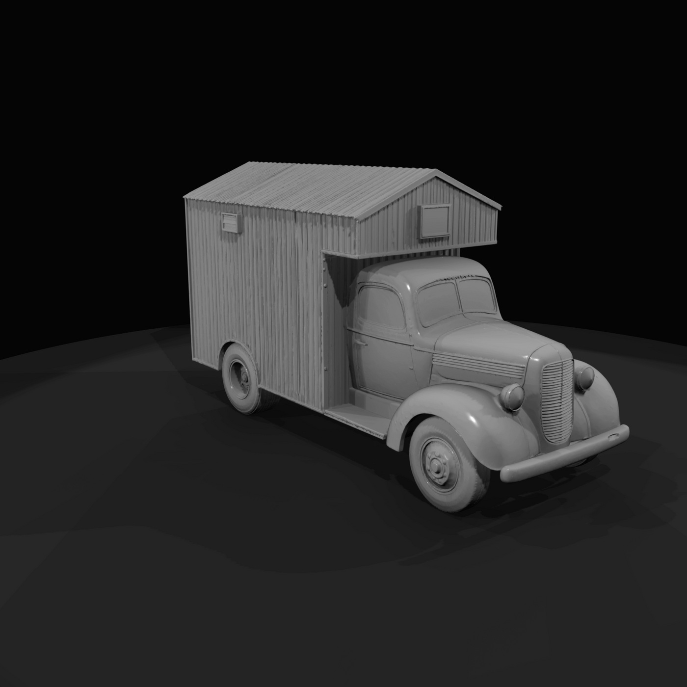 Period light-duty truck chassis with a corrugated metal or wooden mobile-cabin body mounted on the bed