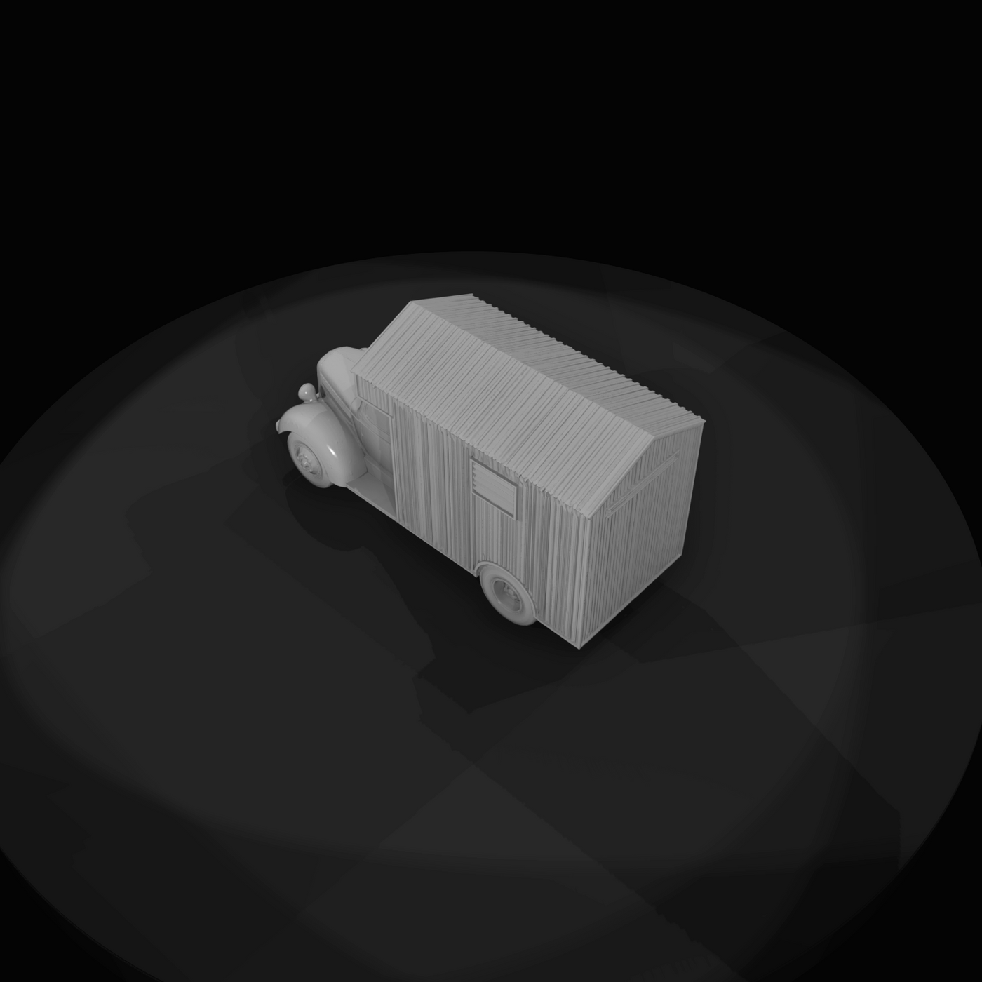 Period light-duty truck chassis with a corrugated metal or wooden mobile-cabin body mounted on the bed