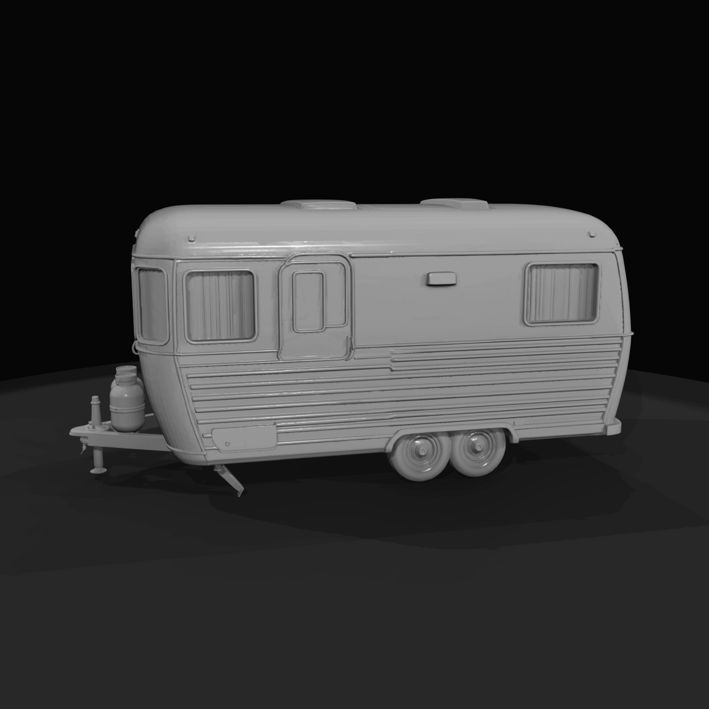 towed travel trailer with rounded front, corrugated side panels, dual axle and front hitch with two propane tanks