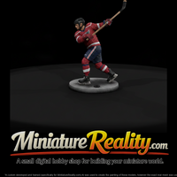 Ice Hockey Player Taking a Slap Shot — thumbnail 2