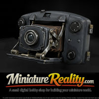 vintage-folding-bellows-film-camera-prop-3e3e91 — thumbnail 1