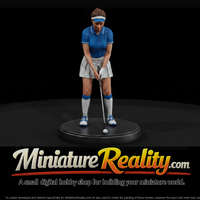 Woman Golfer Lining Up a Putt — thumbnail 1