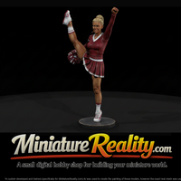 Cheerleader in a High Kick with Pom-Poms — thumbnail 1