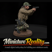 Kneeling Tactical Officer Aiming a Pistol — thumbnail 1