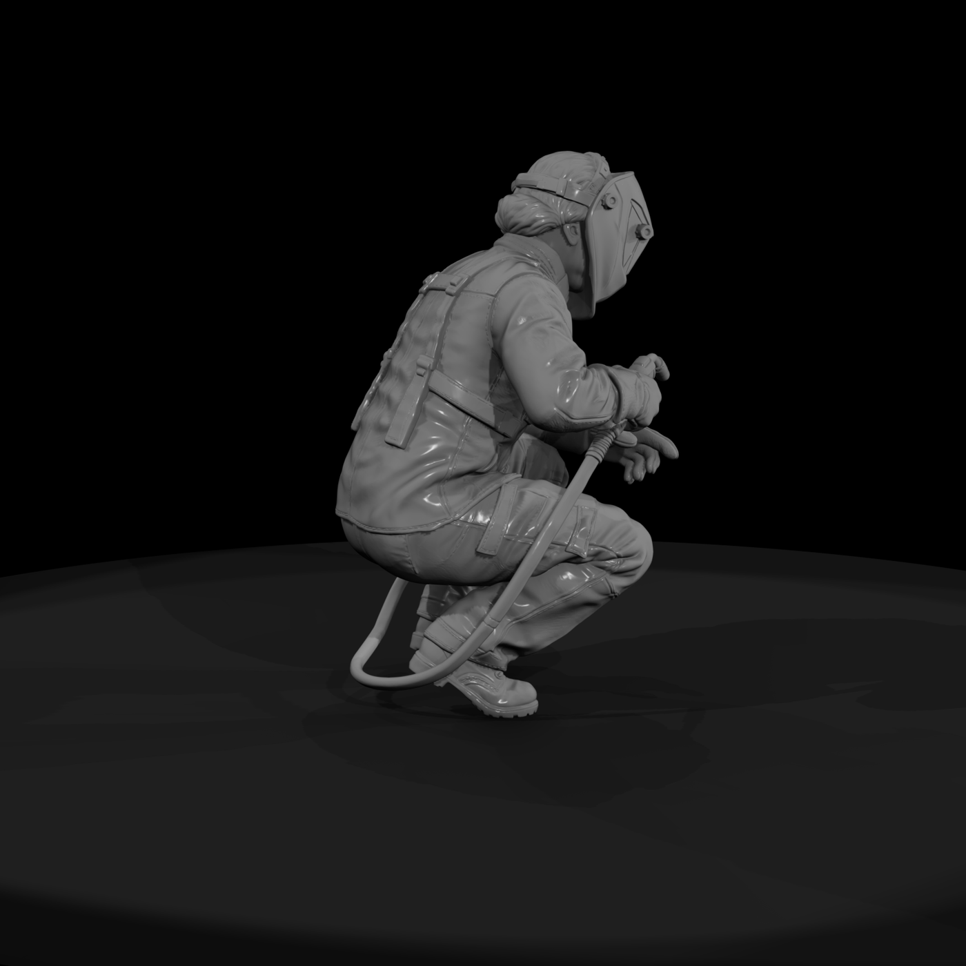 Crouching Welder at Work with Torch