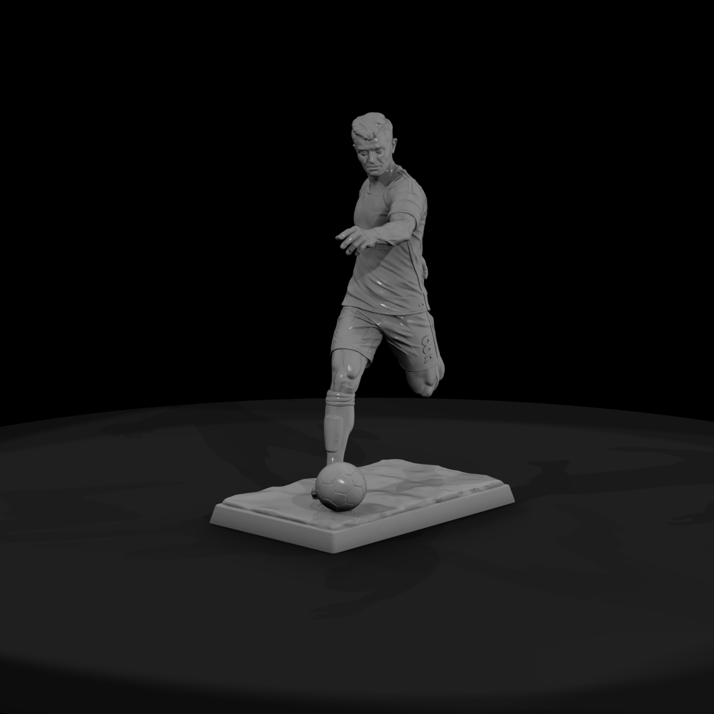 Soccer Player Striking the Ball