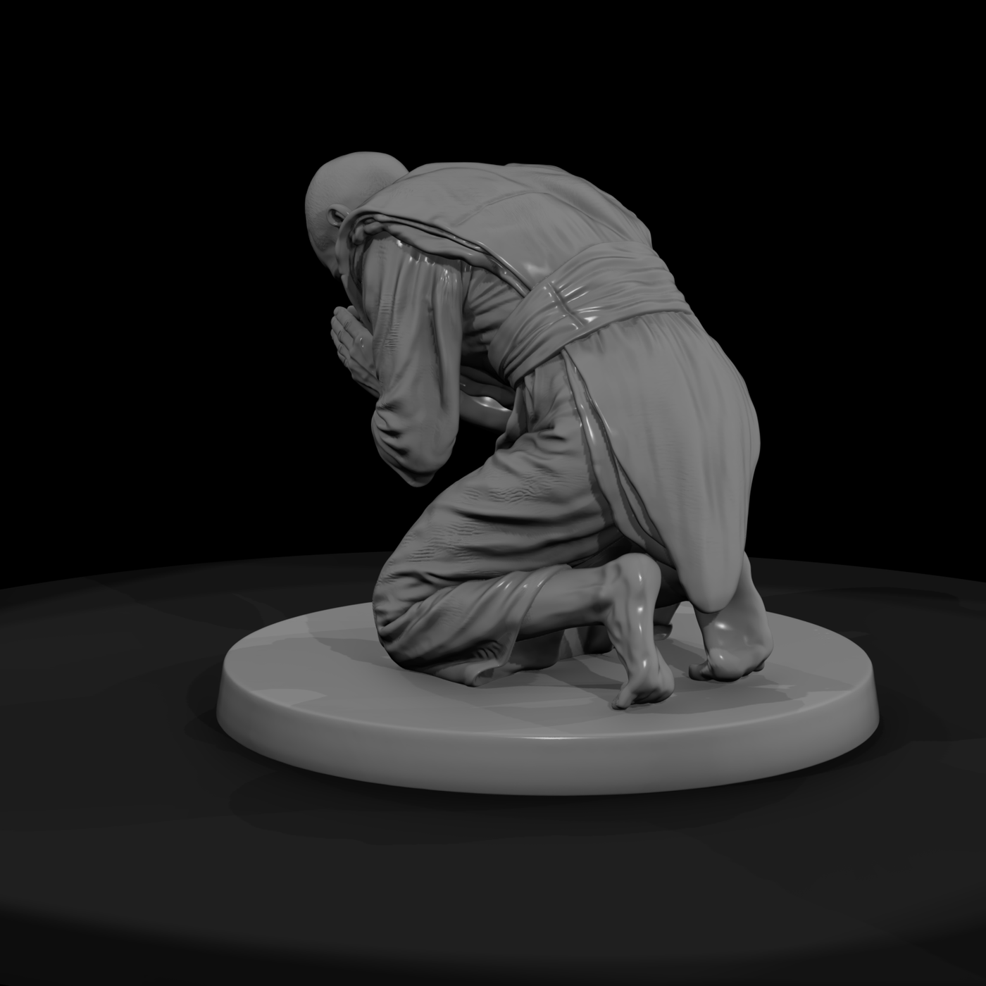 Kneeling Buddhist Monk in Prayer