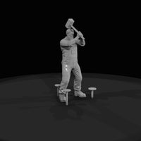 lumberjack-with-sledgehammer-driving-spikes — thumbnail 3
