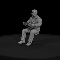 seated-truck-drivers-white-male — thumbnail 4