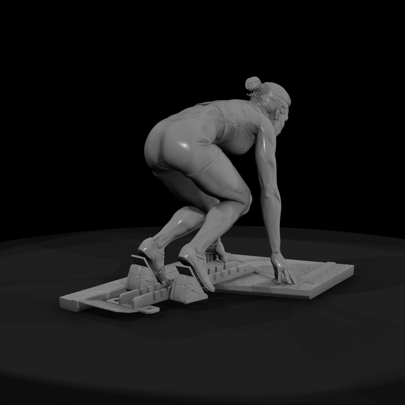 Track Sprinter in Starting Blocks