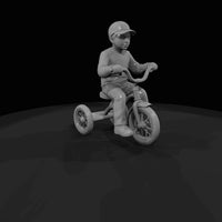 little-boy-on-tricycle — thumbnail 3