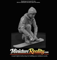 winter-skier-young-man-adjusting-snowboard-bindings — thumbnail 3