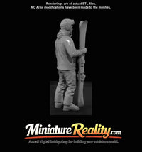 winter-skier-man-standing-holding-skis — thumbnail 3