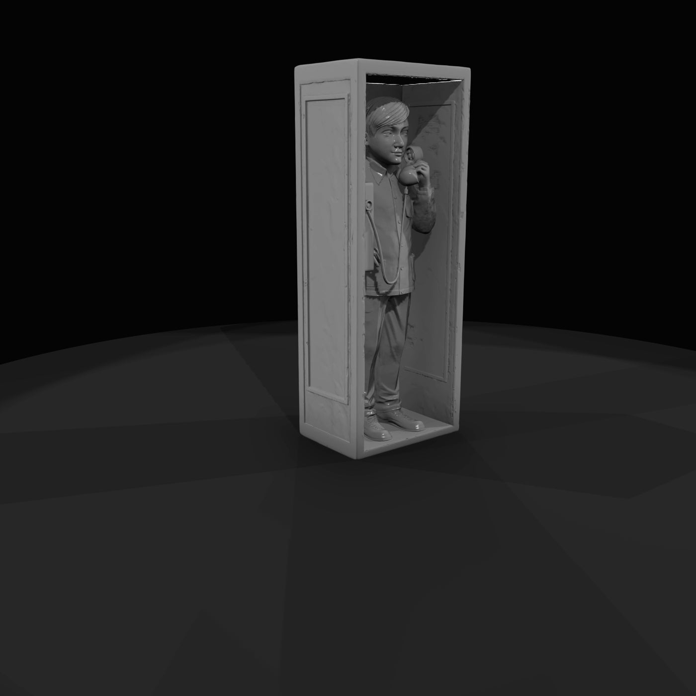 boy-seated-in-a-public-telephone-booth