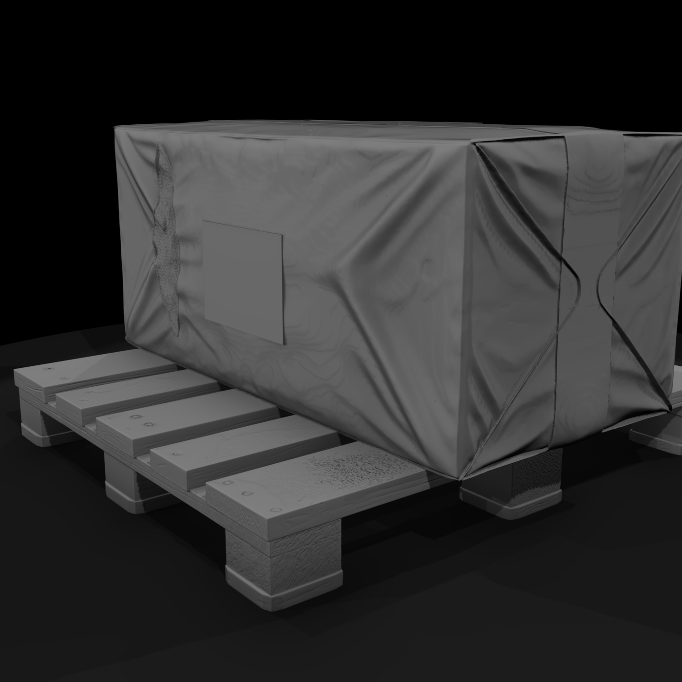 Tarp-wrapped cargo on wooden pallet