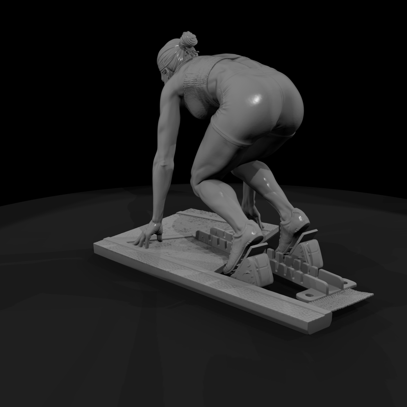 Track Sprinter in Starting Blocks