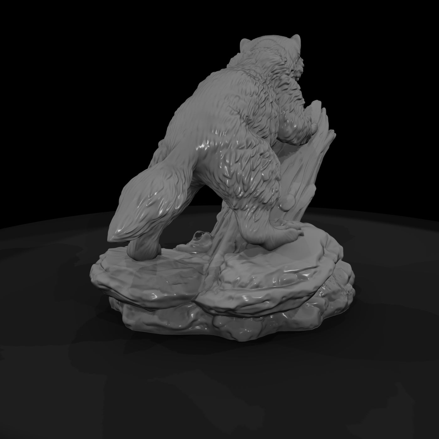 juvenile-wolverine-figurine-on-rock-wildlife-658058