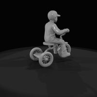 little-boy-on-tricycle — thumbnail 5