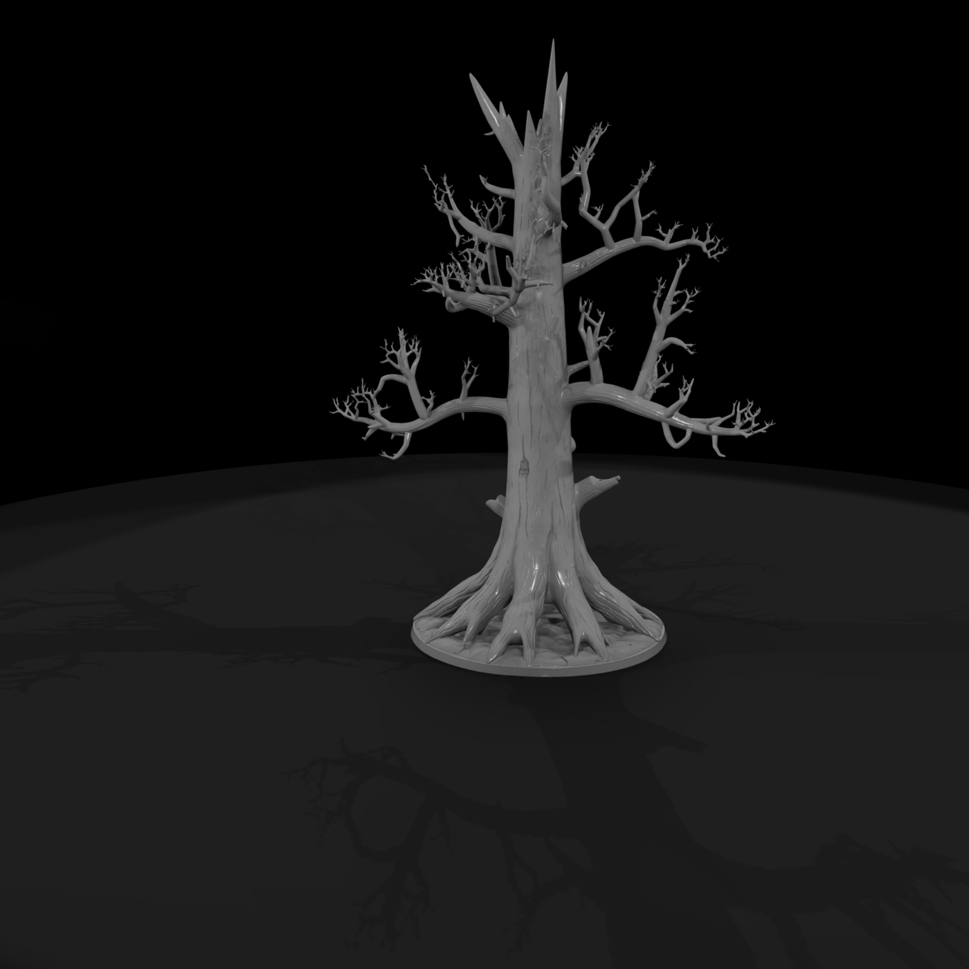 Bare dead snag tree with exposed roots
