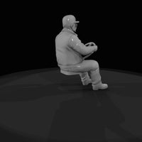 seated-male-driver-figurine — thumbnail 5