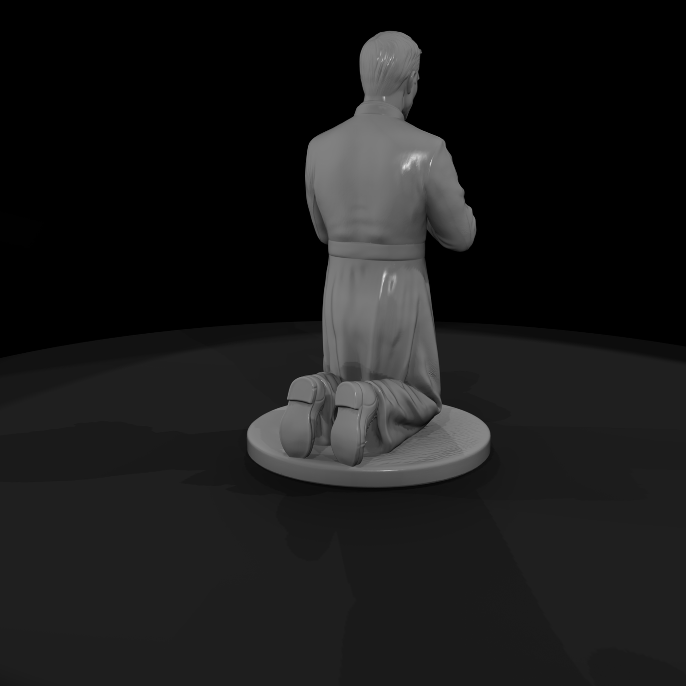 Kneeling Priest in Prayer