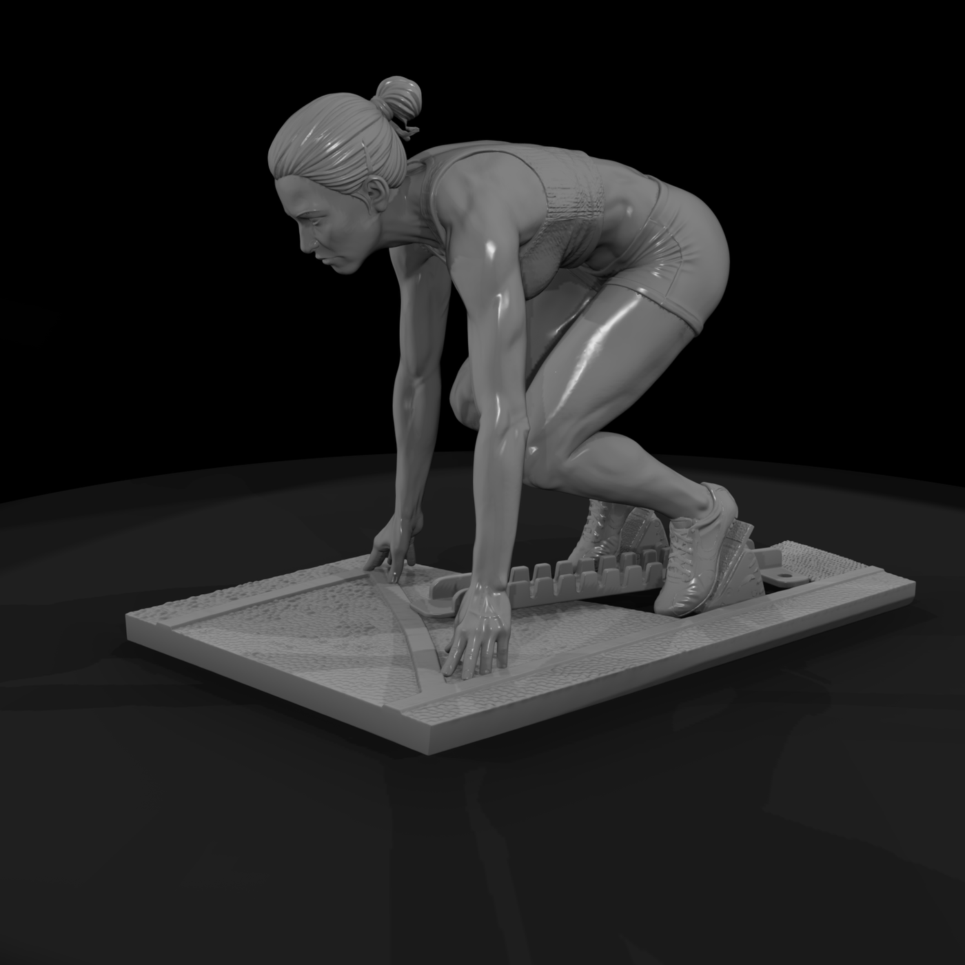 Track Sprinter in Starting Blocks