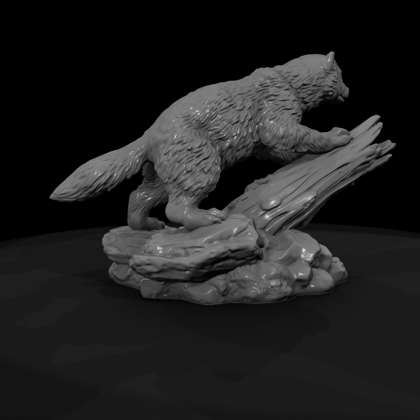 juvenile-wolverine-figurine-on-rock-wildlife-658058
