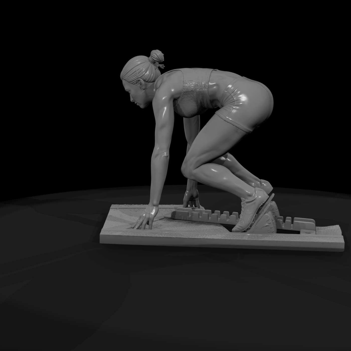Track Sprinter in Starting Blocks