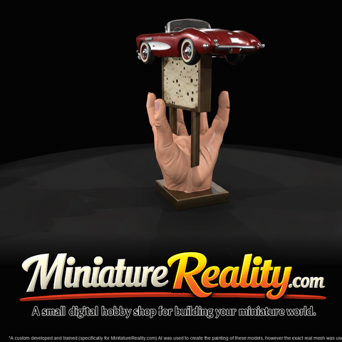 hand holding car model