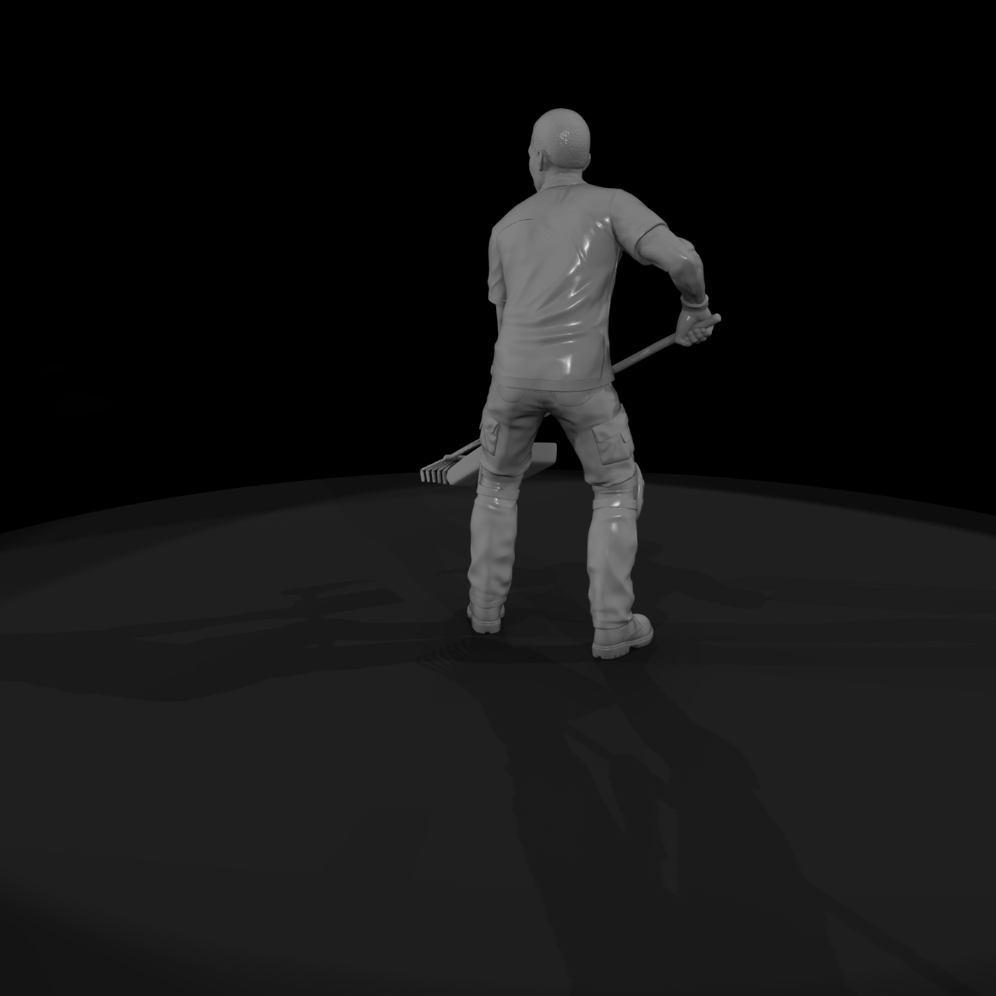 Kneeling Landscaper Figure with Rake and Mulch