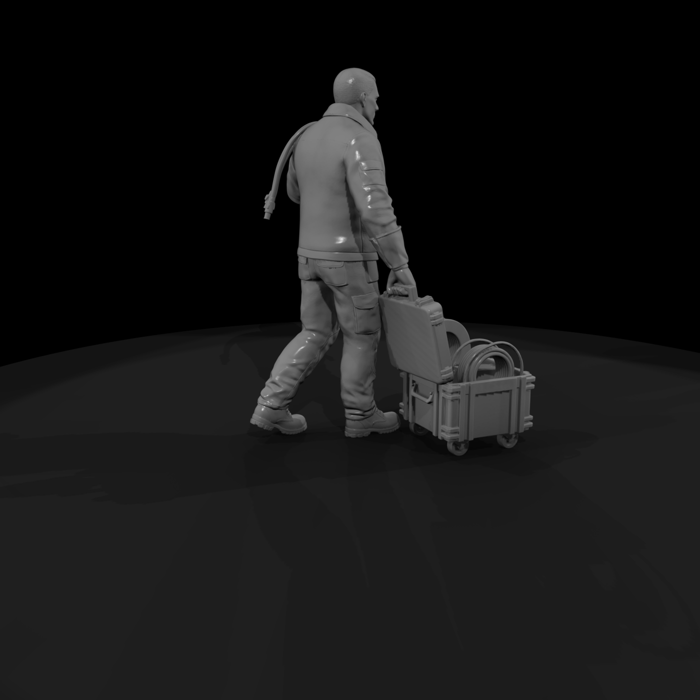 Motorsport pit crew technician with equipment crate