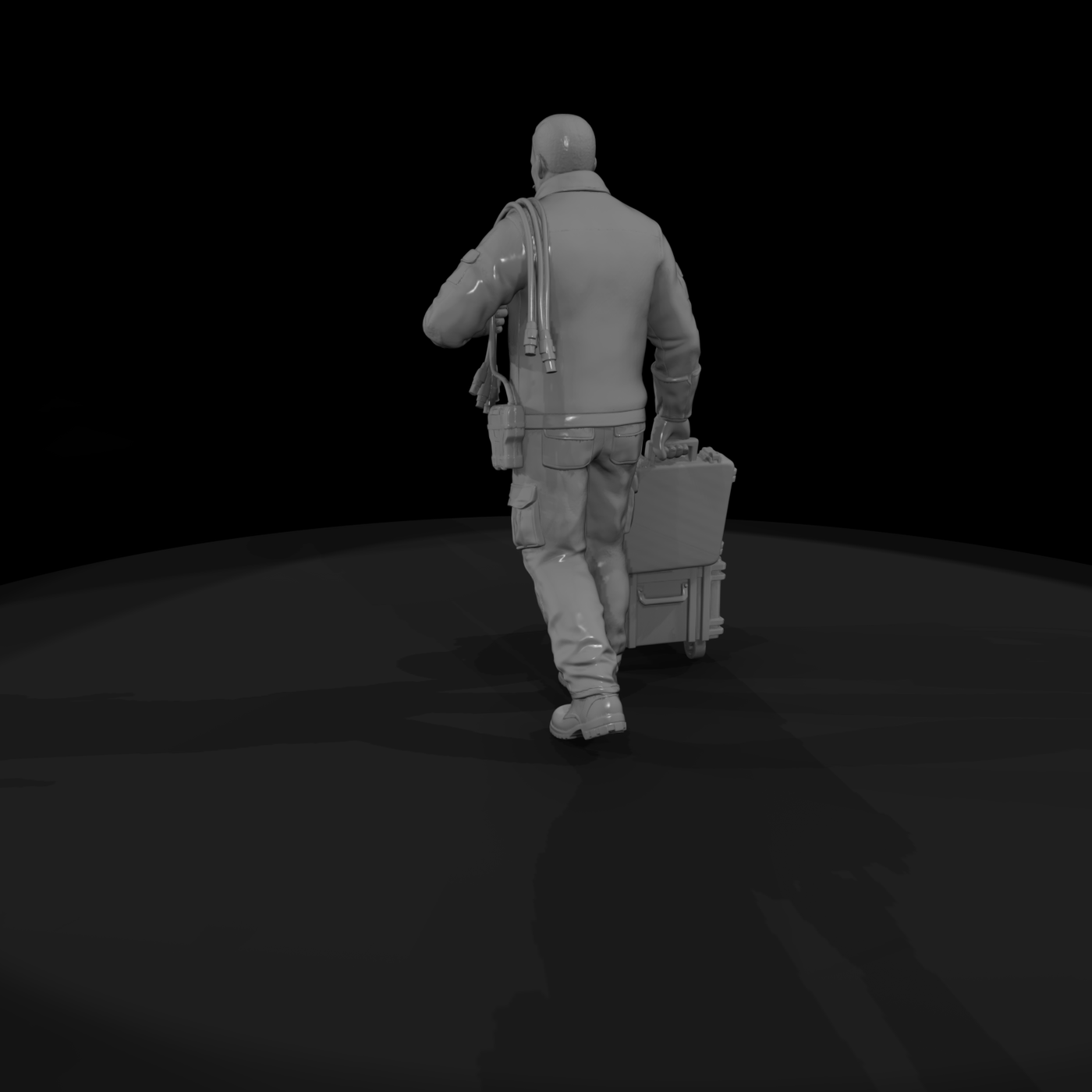 Motorsport pit crew technician with equipment crate