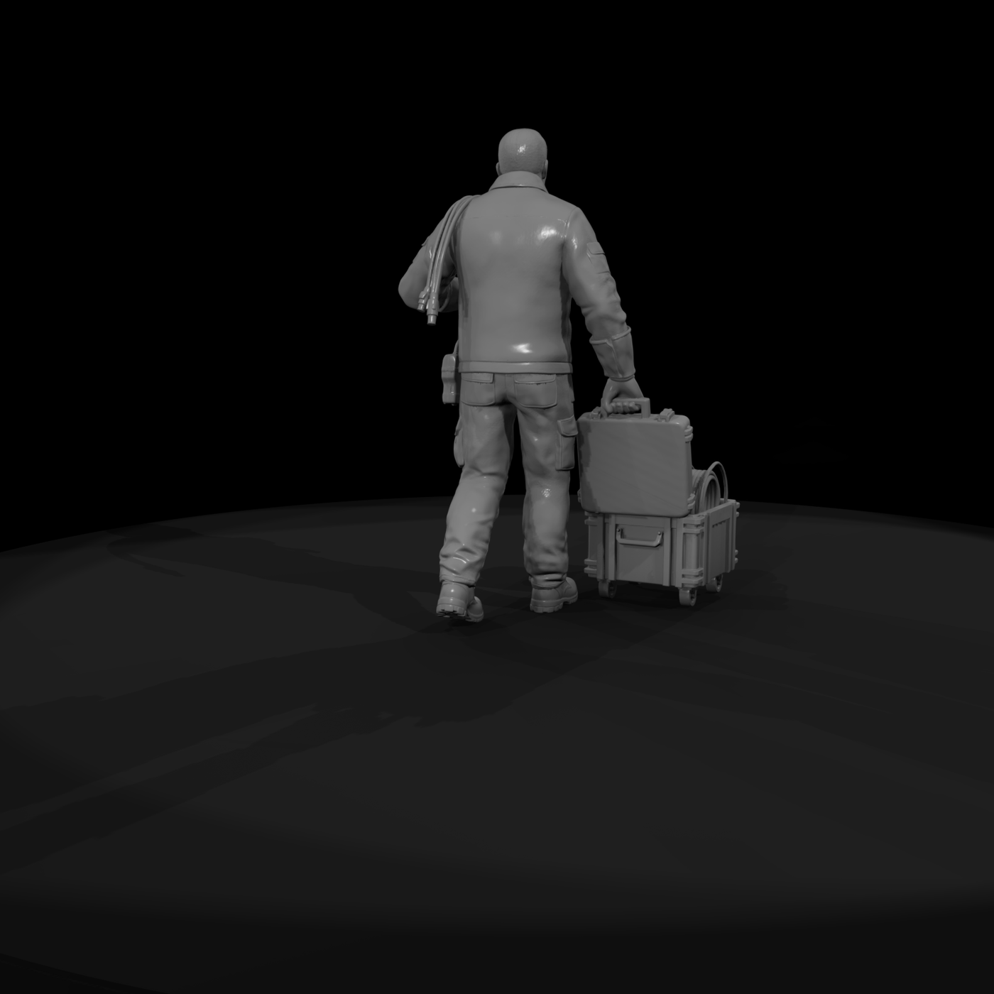 Motorsport pit crew technician with equipment crate